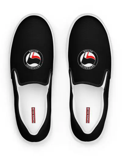 Step into activism with our Antifascist Action Men’s Slip-on Canvas Shoes. These sleek black shoes feature the iconic Antifa design, making a bold statement wherever you go. With elastic side accents for easy wear, a breathable lining keeps your feet comfortable all day long. The soft insole adds extra cushioning.