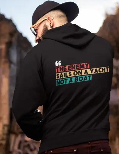 THE ENEMY SAILS ON A YACHT, NOT A BOAT Unisex Heavy Blend Zip Hoodie